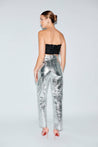 High waist silver faux leather pants with black feather crop top