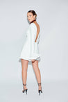 White mini dress with low back and bell sleeves 